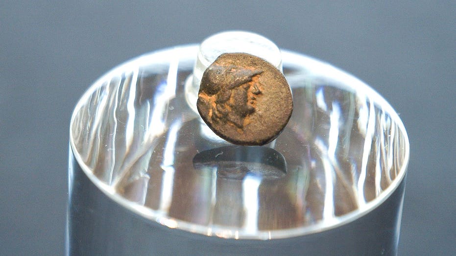 Teen stumbles on mysterious coin from legendary city, puzzling archaeologists over its journey Schools Australia